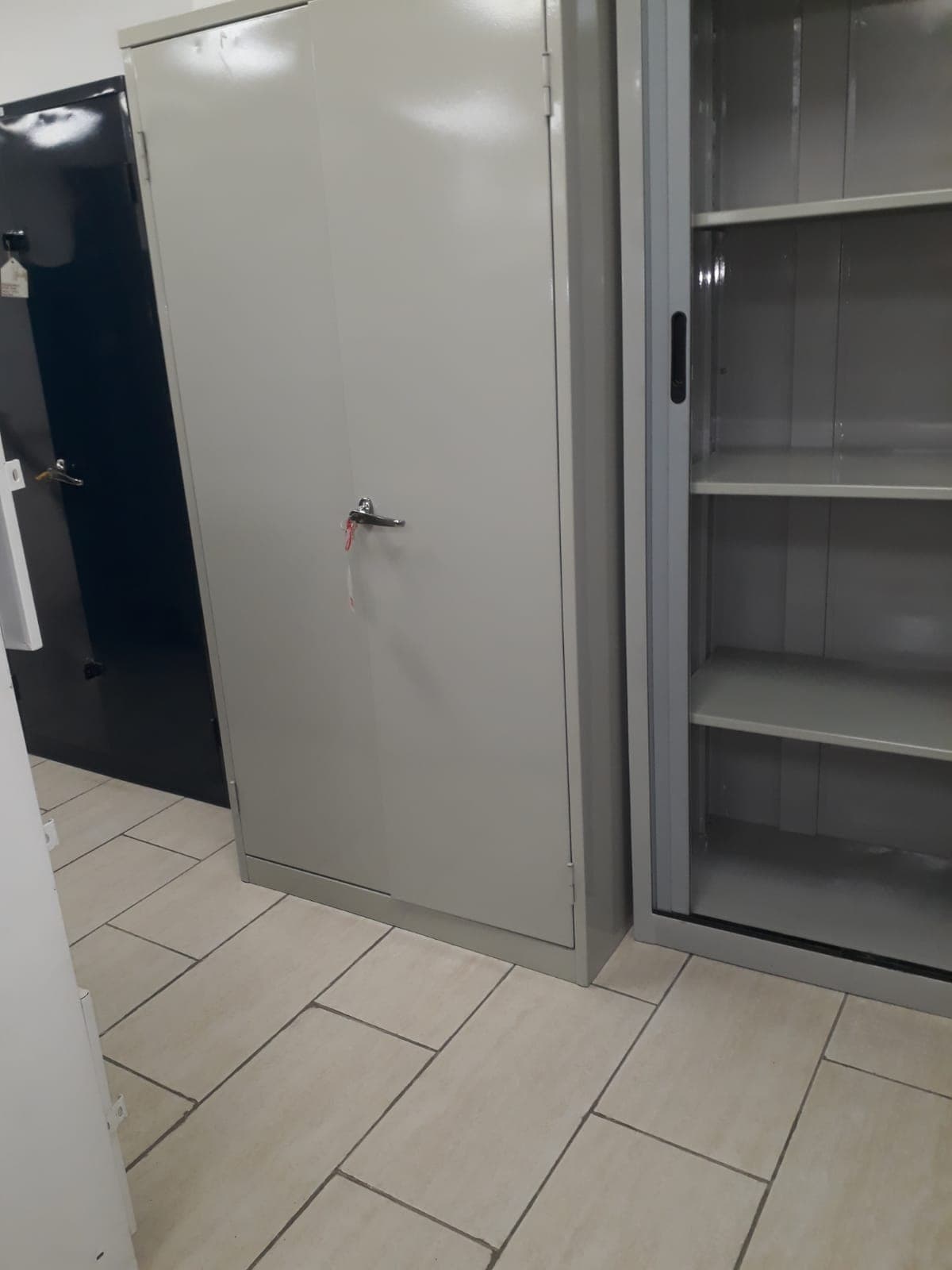 Stationery lockable two door cabinet